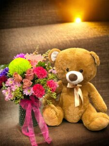 FLOWERS AND TEDDY