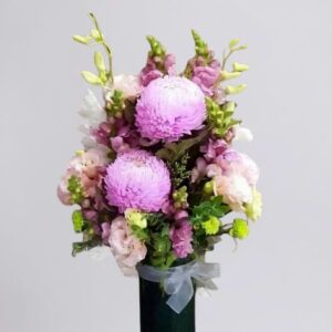 Elegant Glass Vase and Luxury Flowers in Different Shades of Pink